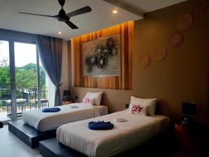 Кровать или кровати в номере In Touch Resort