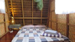Un ou plusieurs lits dans un hébergement de l'établissement Lazy Lizard Hostel