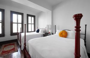 Postel nebo postele na pokoji v ubytování Hotel Havana