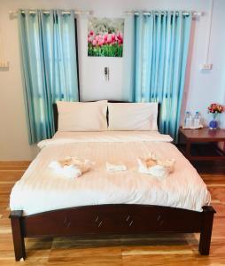 מיטה או מיטות בחדר ב-MP Resort