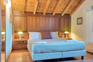 Llit o llits en una habitació de Albergo Villa Priula