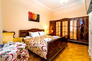Postel nebo postele na pokoji v ubytování V Park Hotel