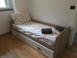 Łóżko lub łóżka w pokoju w obiekcie VILLA DEGLI ULIVI