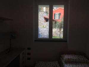 Łóżko lub łóżka w pokoju w obiekcie VILLA DEGLI ULIVI