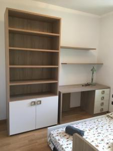 Łóżko lub łóżka w pokoju w obiekcie VILLA DEGLI ULIVI