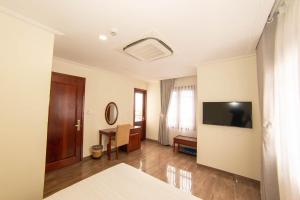TV a/nebo společenská místnost v ubytování Trường Hải Hotel