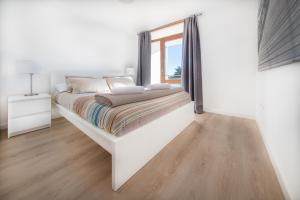 Postel nebo postele na pokoji v ubytování Agaró Cambrils Apartments