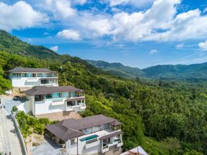 an aerial view of a house in the mountains at Stunning sea view villa Lamai Koh Samui in Lamai