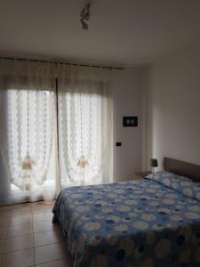 Postel nebo postele na pokoji v ubytování Casa Elisena