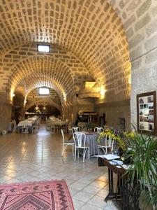 Restaurant o un lloc per menjar a Antica Masseria Jorche