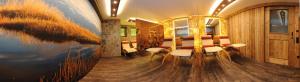A seating area at Ski in Ski out Hotel Unterellmau