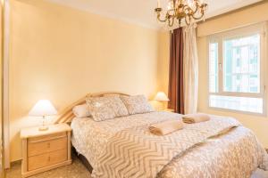 Postel nebo postele na pokoji v ubytování Sweethome El Palo