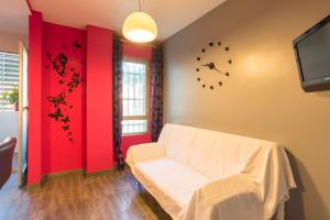 Postel nebo postele na pokoji v ubytování Sweethome El Palo