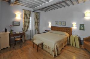 Posteľ alebo postele v izbe v ubytovaní Agriturismo La Sovana