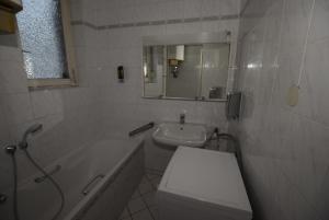 Ett badrum på Apartment Bad Canstatt
