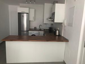 Kuchnia lub aneks kuchenny w obiekcie Málaga Apartamentos - Jinetes, 10