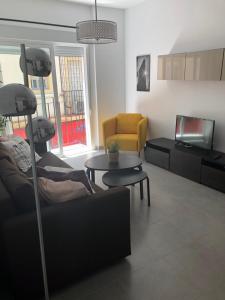 Część wypoczynkowa w obiekcie Málaga Apartamentos - Jinetes, 10