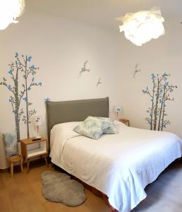A bed or beds in a room at Affittacamere I Gatti delle 5 Terre