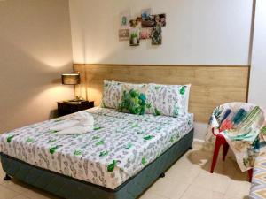 Postel nebo postele na pokoji v ubytování VL Garden Suites