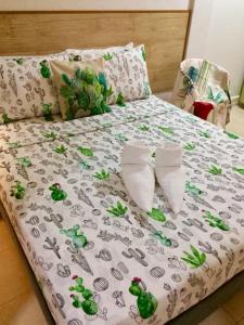 Postel nebo postele na pokoji v ubytování VL Garden Suites