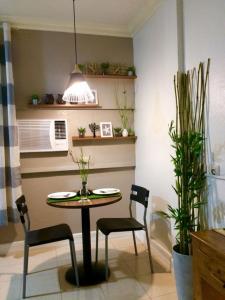 Kuchyň nebo kuchyňský kout v ubytování VL Garden Suites