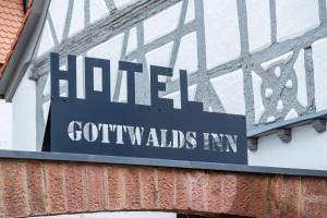 a sign that reads harlemgoblins nw on a building at Gottwalds Inn in Obernburg am Main