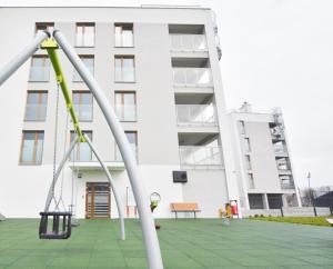Plac zabaw dla dzieci w obiekcie Apartamenty Bałtycka6
