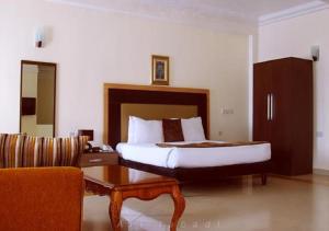 Postelja oz. postelje v sobi nastanitve BWC Hotel