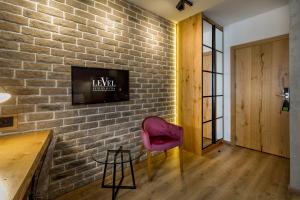 TV a/nebo společenská místnost v ubytování Level Luxury Suites