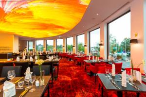 En restaurang eller annat matställe på Sieben Welten Hotel & Spa Resort