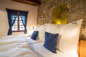 Letto o letti in una camera di ANTIK