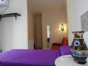 Łóżko lub łóżka w pokoju w obiekcie Antilla Riad