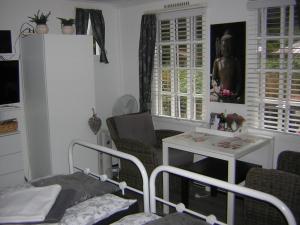 Photo de la galerie de l'établissement Prive tuinhuis B&B Elly, à Sint Pancras
