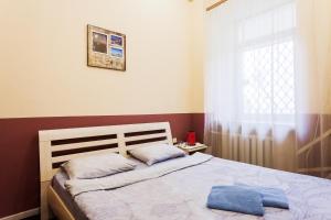 Postel nebo postele na pokoji v ubytování Mini-hotel in the heart of Kiev