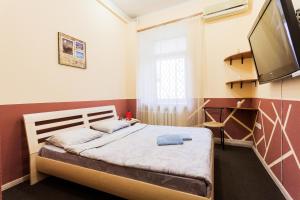 Postel nebo postele na pokoji v ubytování Mini-hotel in the heart of Kiev