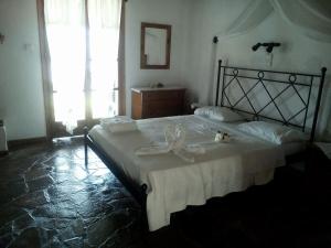Ένα ή περισσότερα κρεβάτια σε δωμάτιο στο Panoramma Hause, Kampos Evdilou,Ikaria