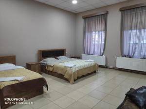 Una cama o camas en una habitación de Ideal