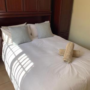 Katil atau katil-katil dalam bilik di Villa de la Rosa Klerksdorp