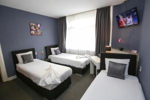 Postel nebo postele na pokoji v ubytování Hotel Flipper Amsterdam + 37 fotografií