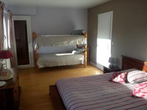 Postel nebo postele na pokoji v ubytování Bellavie - Maison d'hôtes