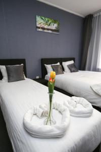 Postel nebo postele na pokoji v ubytování Hotel Flipper Amsterdam