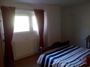 Postel nebo postele na pokoji v ubytování Bellavie - Maison d'hôtes