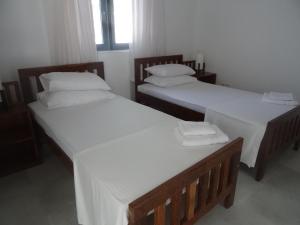 Letto o letti in una camera di Amssler Beach Stay