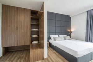 Cama o camas de una habitación en Hotel Tau