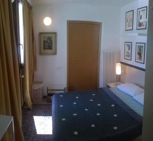 Letto o letti in una camera di Residence Dei Walser