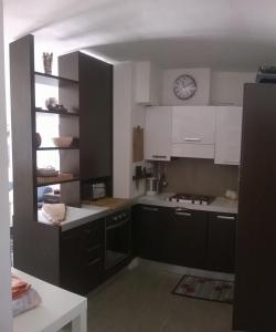 Kuchyň nebo kuchyňský kout v ubytování Residence Dei Walser + 37 fotografií