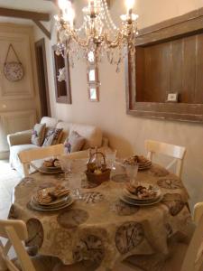 a dining room table with plates of food on it at Apartamento Romántico in Valencia