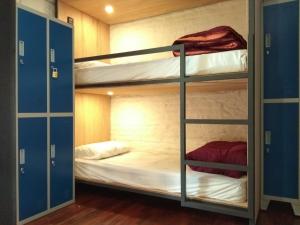 Postel nebo postele na pokoji v ubytování MedioMundo Hostel