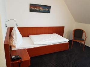 Letto o letti in una camera di Hotel Walz