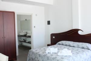 Voodi või voodid majutusasutuse Max Luxury Suite - Servizio Spiaggia Inclusa toas
